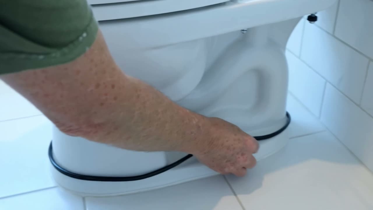 Sample clip poster: hand plugging a seat power cord into a wall outlet